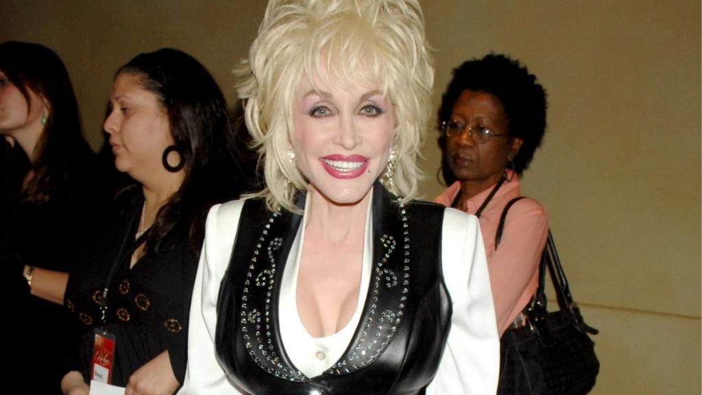 Dolly Parton’s Beloved Reading Program at Risk After Republicans Slash Funding