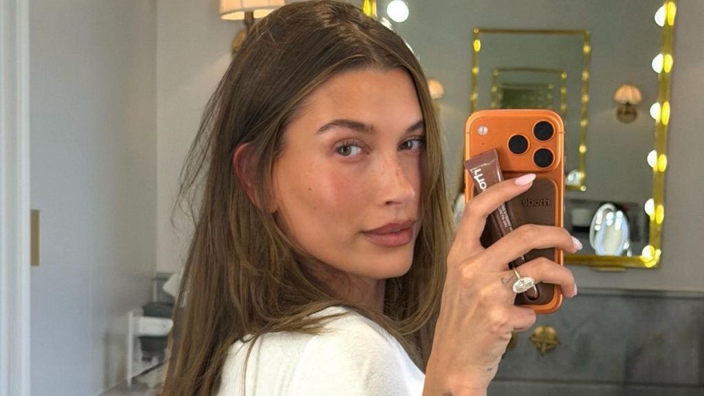 Hailey Bieber Is ‘Catching Feelings’ in a Skimpy Cami Top That Rides Up
