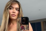 Karol G Drops Her Teeny Tiny Shorts a Little Too Low To Cause Frenzy