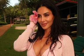 Kim Kardashian Drops Her Cardigan To Unveil a Seriously Daring Bralette