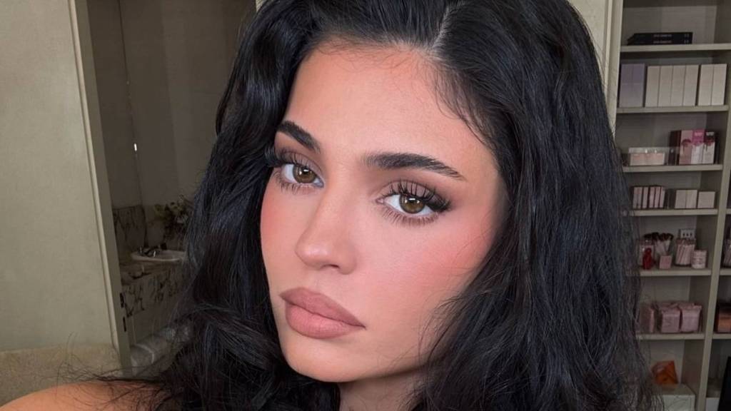Kylie Jenner Nearly Spills Out of a Dress That Plunges Straight to Her Waist