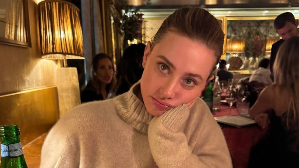Lili Reinhart’s Micro Minidress Is So Tiny, It Hides Under Her Blazer