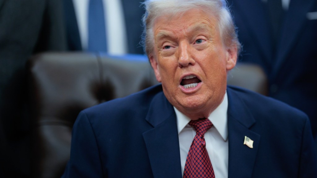 Donald Trump's New AI Photo Includes Tombstone Labeled 'Buried By Biden'