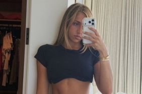 Tate McRae Bares Her Toned Midriff in a Teeny Tiny Tucked-up Top