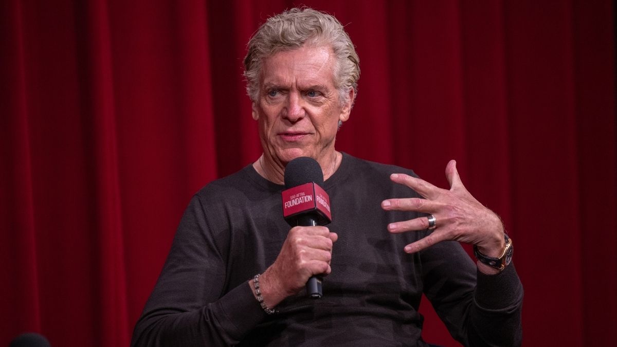 Christopher McDonald speaking at a retrospective event discussing his career and relationships