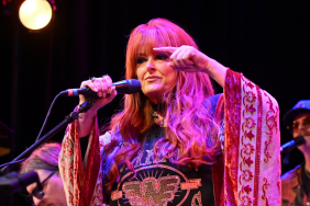 Wynonna Judd performing onstage amid the release of her personal new song “Girl Who Could Sing.”
