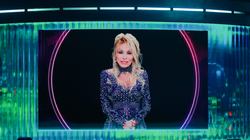 Dolly Parton amid her health update after dizziness and dehydration kept her from the Dollywood NightFlight Expedition opening