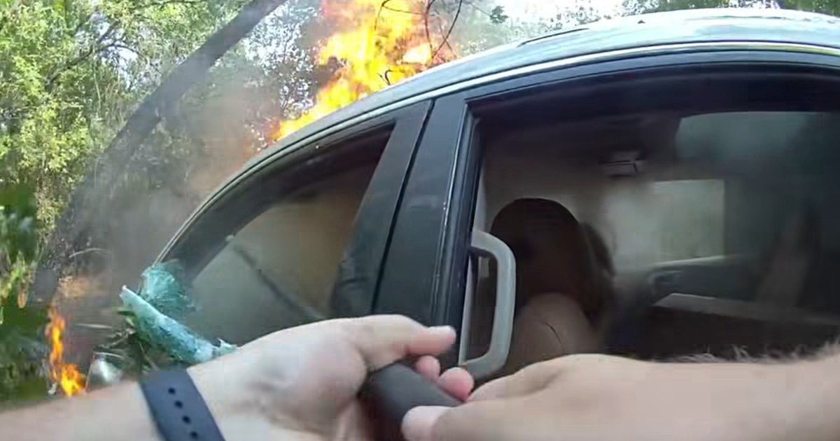 Man Trapped in Car Fire Resists Rescuers in Harrowing Bodycam Footage