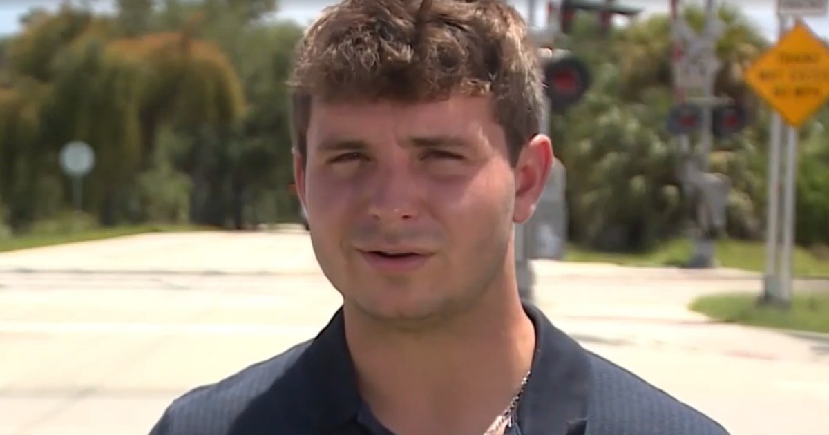 Intense Video Shows Young Man Saving Woman in SUV From Being Struck by Train