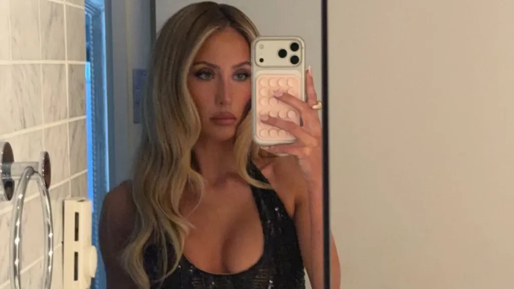 Alix Earle’s Glittering Black Dress Is Daringly Sheer From the Waist Down