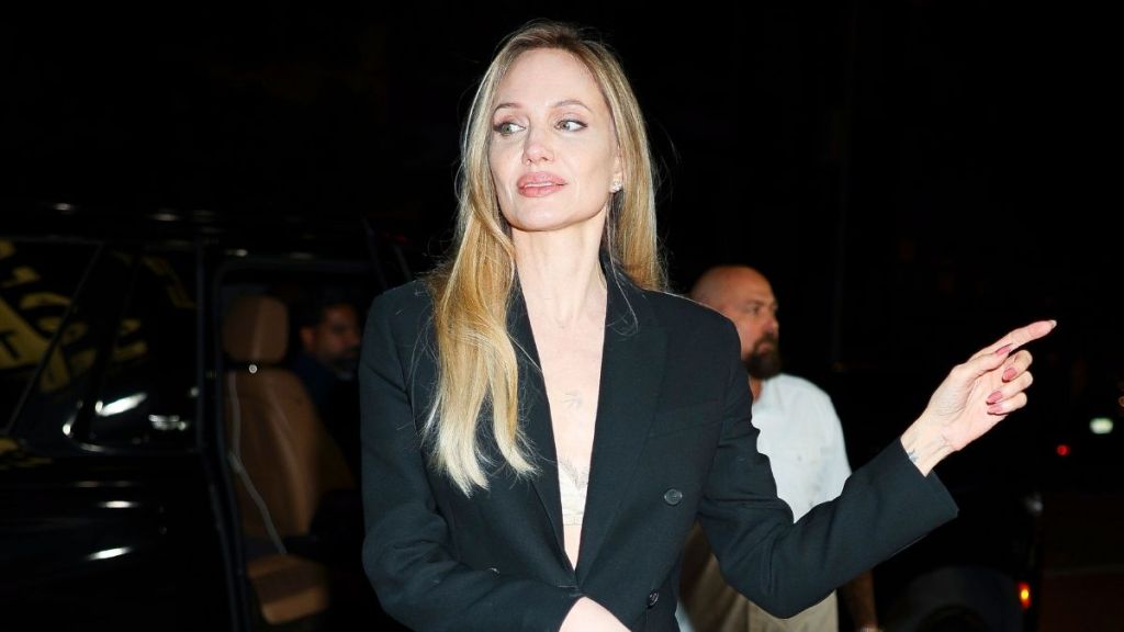 Angelina Jolie’s Blazer Slips Low Enough To Reveal Her Nude Bra