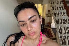 Charli XCX Poses in Bed in Nothing but a Skimpy Plunging Lace Bra
