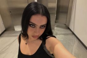 Charli XCX’s Sultry London Look Features Fully Open Jacket & Her Hand Doing the Job of a Top