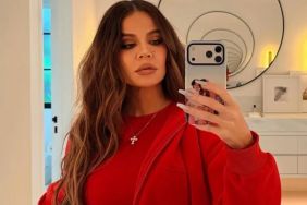 Khloe Kardashian’s Low-Cut Black Dress Doubles Down With a Waist-High Slit
