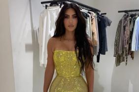 Kim Kardashian Pulls Off a Gold Plunging Halter Dress That Leaves Little Room for Subtlety