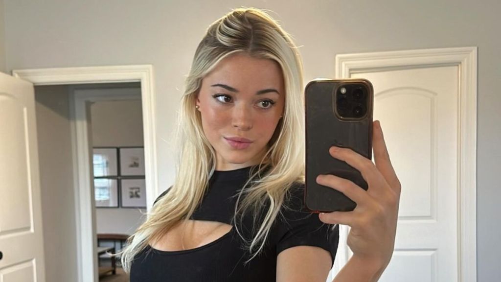 Livvy Dunne’s Cami Top Barely Hangs on With Micro Miniskirt at LSU Event