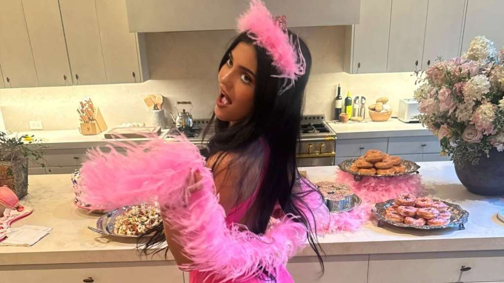 Kylie Jenner’s Halter Top Hangs on for Dear Life as She Bares Her Back & Sides