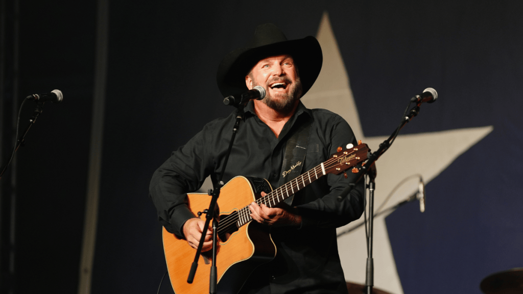 Garth Brooks performs during a surprise Colorado concert where several fans received treatment for heat-related illnesses