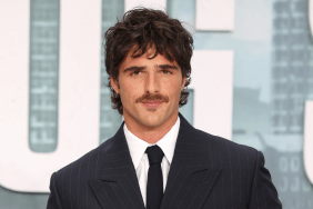 Jacob Elordi reacts to paparazzi while out in Paris with Kendall Jenner.