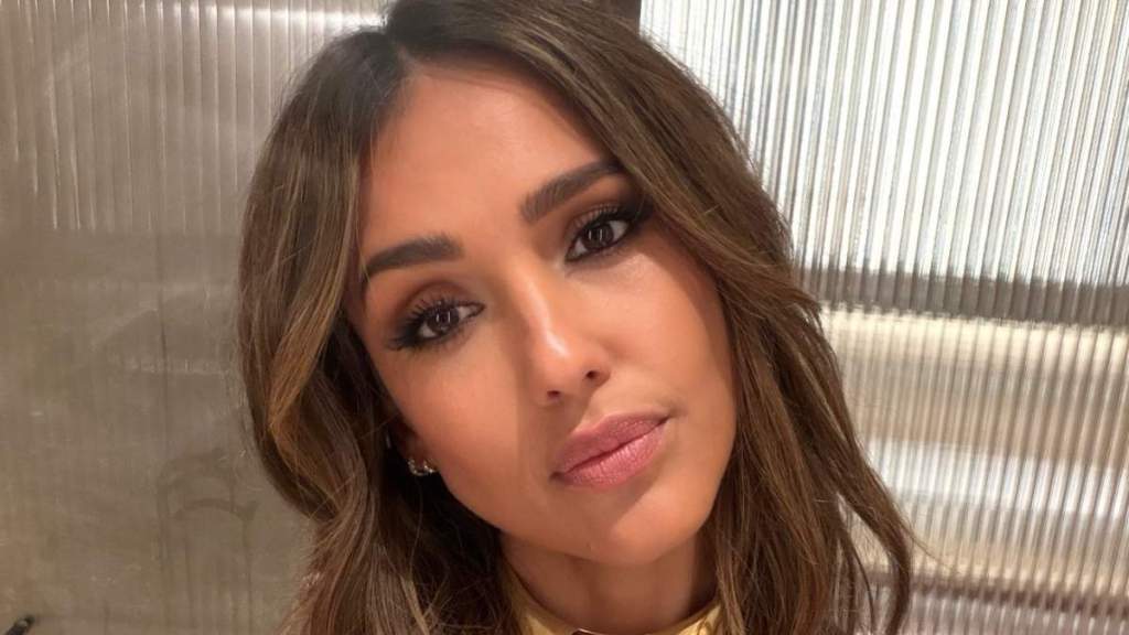 Jessica Alba Serves up Date-Night Glam in a Plunging Black Slip Dress