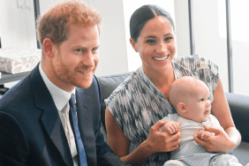 Meghan Markle holds a young Prince Archie as the Sussex family begins a new chapter in the U.K.