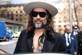 Russell Brand jokes about a backstage hug with Brooke Rollins while appearing at a MAHA summit.
