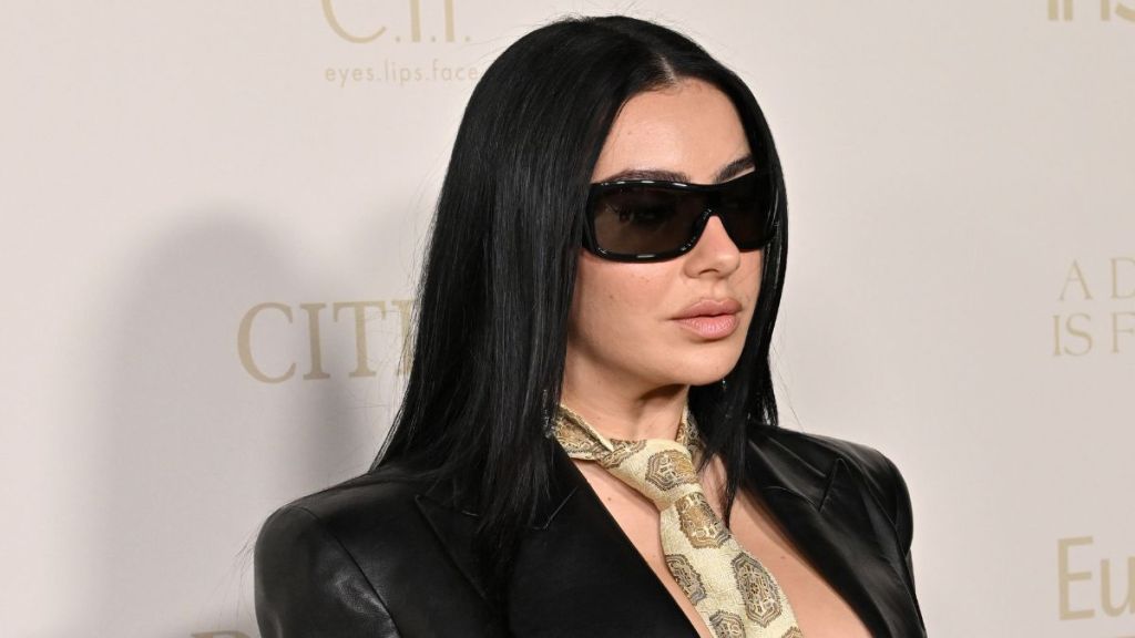 Charli XCX Is a ‘Sexy Rockstar’ as She Goes Braless Under Leather Blazer