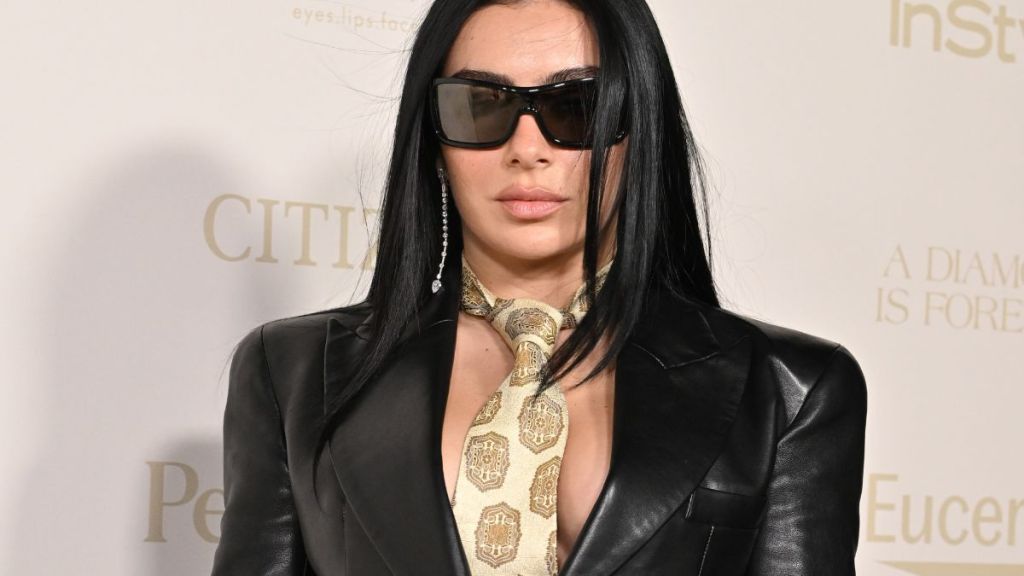Charli XCX Wears a Tie Against Bare Skin Under Her Plunging Blazer