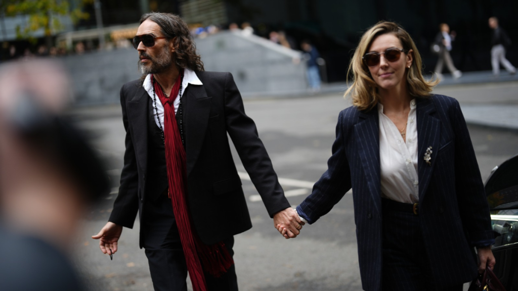 Russell Brand's wife, Laura Gallacher, testifies about their 2007 breakup and his past struggles with monogamy during his sexual assault trial.