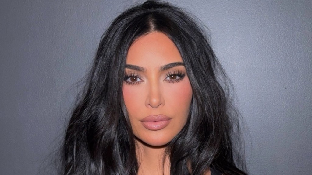 Kim Kardashian Goes Nude in Body-Hugging Dress With Thigh-High Slit