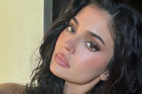 Kylie Jenner Nearly Spills Out of Plunging Bodysuit Hanging on to Dear Life
