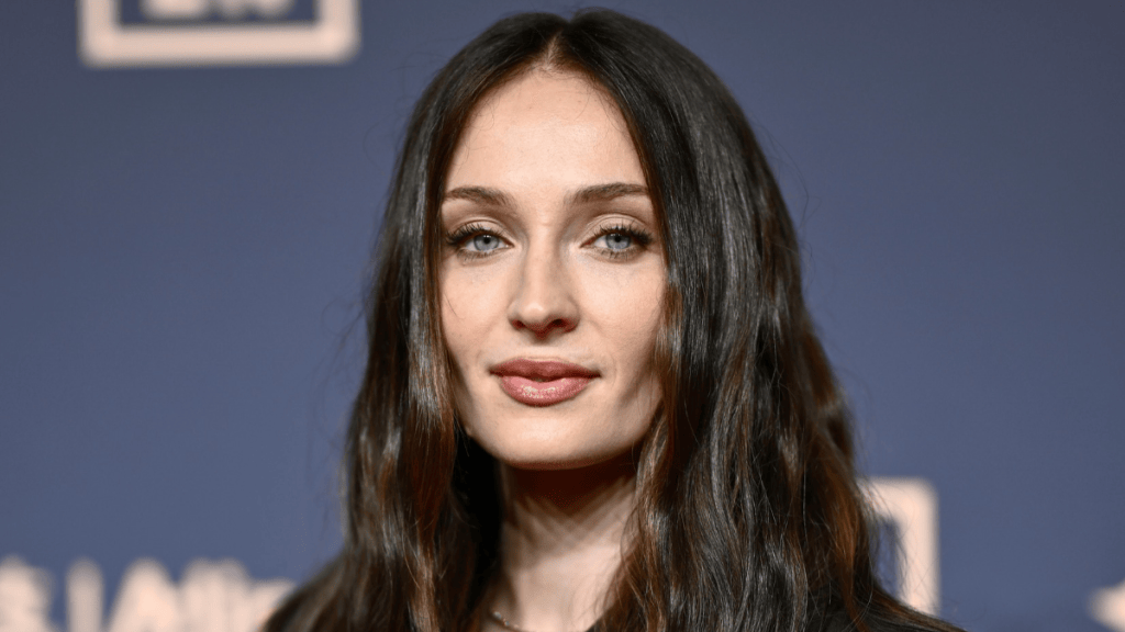 Sophie Turner debuts a new dark brunette hairstyle at the 70th Ballon d'Or ceremony.
