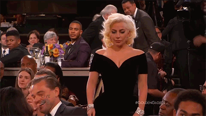 Lady Gaga Rubs Leo's Elbow