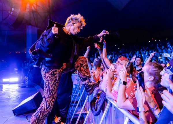 Machine Gun Kelly Punches Concertgoer in the Face at Louder Than Life Festival (Video)