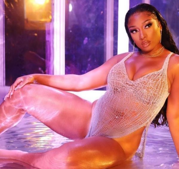 Megan Thee Stallion’s See-Through Dress in ‘Sexy Girl’ Video Says ‘I’ll Only Cover the Bare Minimum,’ Think We Know Who the ‘Sexy Girl’ May Be
