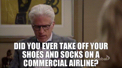 Taking your shoes and socks off on a plane.